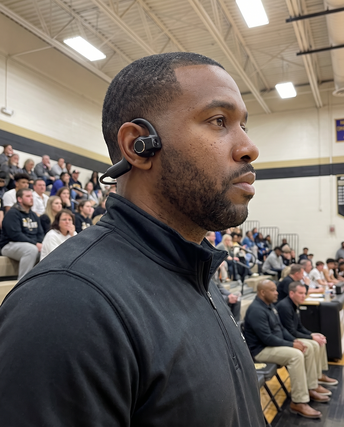 Basketball coach wearing GameDayCam courtside